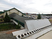 A section of incomplete track at the William F. Walsh Regional Transportation Center, which had been built for OnTrack trains but never connected to the line Pedestrian passage and OnTrack trackbed at Syracuse station, July 2016.jpg