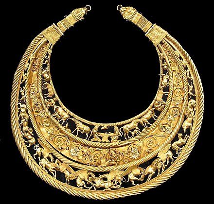 Gold pectoral, or neckpiece, from an aristocratic kurgan in Tovsta Mohyla, Pokrov, Ukraine, dated to the second half of the 4th century BCE, of Greek workmanship. The central lower tier shows three horses, each being torn apart by two griffins. Scythian art was especially focused on animal figures.
