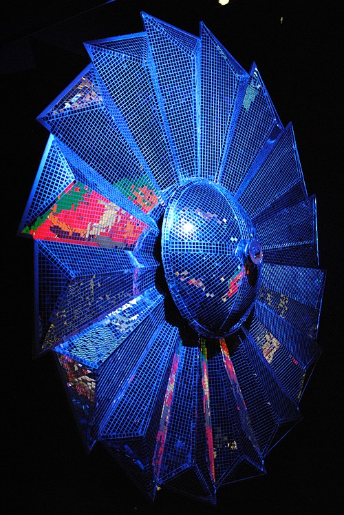 Rotating flower-petal mirror ball, used to reflect spotlights during concerts from 1975 to 1977; displayed at the Pink Floyd: Their Mortal Remains exh