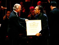 Gilberto Gil - the winner in the contemporary category in 2005, receives the prize from King Carl XVI Gustaf of Sweden