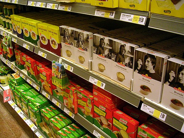 Shelves in a Swedish grocery store showing both private label and international brands.