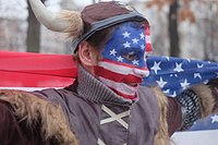 Protester in the costume (cosplaying) 2021 storming of the United States Capitol.jpg