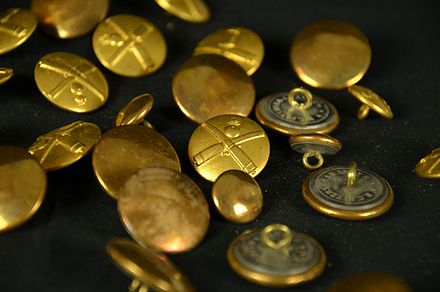 Brass buttons from the uniform of a Danish World War I artillery lieutenant