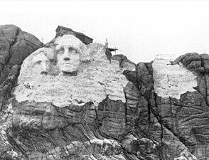 Construction underway, with Jefferson to the left of Washington before unstable rock necessitated a change in the design