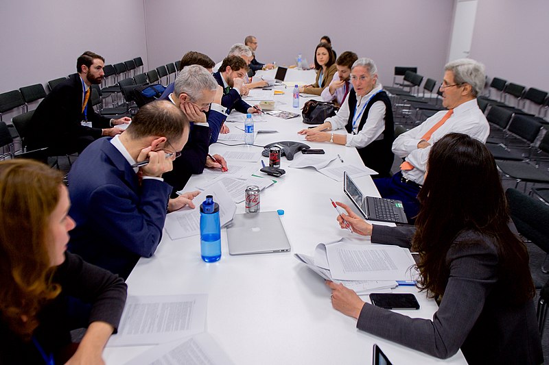 File:Secretary Kerry and a Team of Advisors Discuss the Final Draft Language of The Multinational agreement emerging from the COP21 Climate Change Conference (23069313994).jpg