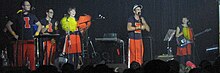 Stevens and band toured dressed in Block I Fighting Illini cheerleading gear Sufjan Cheerleading.jpg