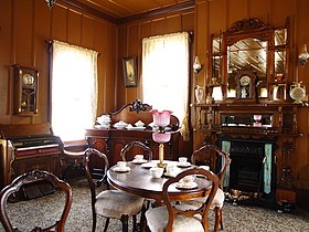 Tea room with interior decoration, Shantytown Historical Park, New Zealand.jpg