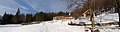 The meadow (covered by snow) in front of the refuge