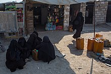 Refugees at the camp on 16 October 2019. VOA in Al-Hol Camp, Syria, 16 October 2019 01.jpg