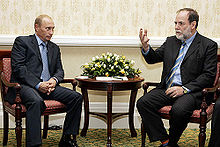 Russian president Vladimir Putin meeting former De Beers chairman Nicky Oppenheimer in South Africa in 2006 Vladimir Putin in South Africa 5-6 September 2006-16.jpg