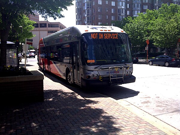 A New Flyer DE42LFA #6567 Local branded bus at the Ballston-MU Metro Station in April 2011.