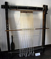 Warp weighted loom with string heddles in the Central Textile Museum in Łódź, Poland