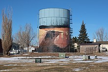 Water tower in Sleepy Hollow painted with a mural based on The Legend of Sleepy Hollow Water tower with a mural in Sleepy Hollow, Campbell County, Wyoming.jpg