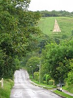 An offwhite triangle cut into the hillside. Watlington White Mark