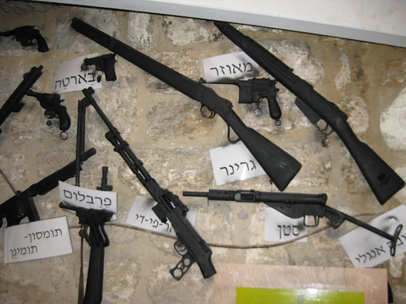 File:Weapons display on Palmach Cave wall.JPG