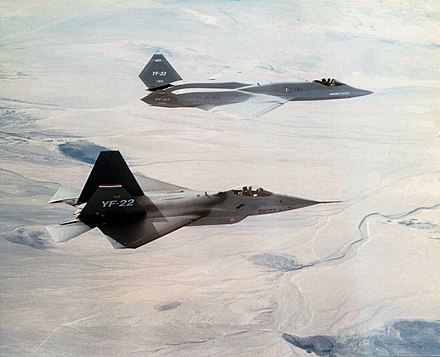 A YF-22 in the foreground with a YF-23 in the background