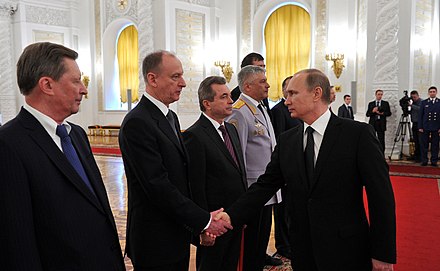 Nikolai Patrushev and Sergei Ivanov with Vladimir Putin on 8 April 2015