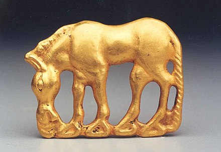 Plaque in the shape of a grazing kulan (wild ass), 2nd–1st century BC, Northwest China, Xiongnu culture.[71][72]