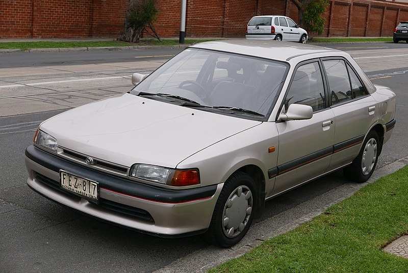 File:1993 Mazda 323 (BG Series 2) 1.8i sedan (2015-07-09) 01.jpg