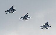 A formation of three F-15C/D Eagles overhead Kadena Air Base in Okinawa, Japan. The aircraft are assigned to the 18th Wing.