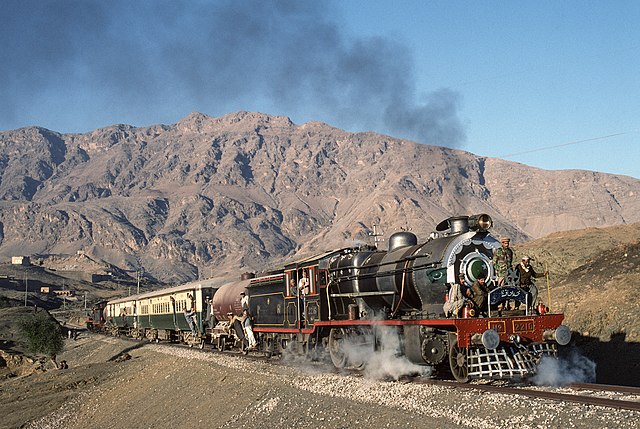 A charter train on Pakistan Railways performs a runby at Shahgai, on the Khyber Pass, in 1993