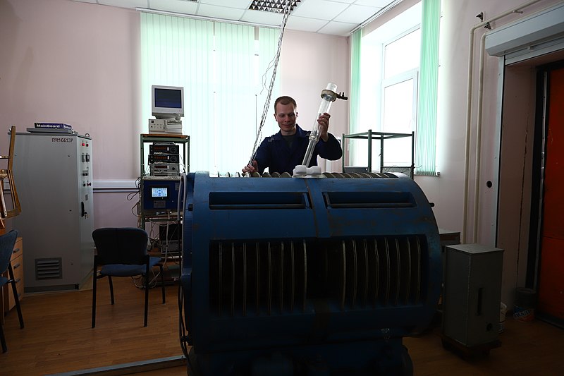 File:A young scientist works on a magnet installation.jpg