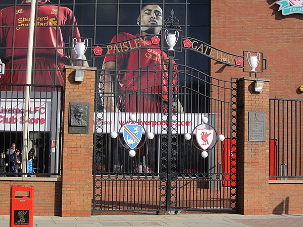 The Paisley Gateway was erected at one of the entrances to Anfield. It includes a depiction of the record three European Cups he won during his tenure