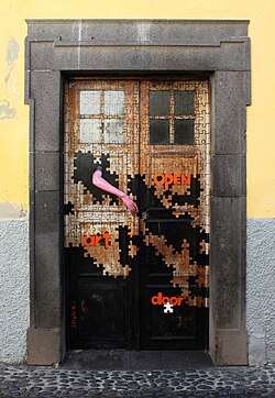 One of the doors of the “ArT of opEN doors project” in Rua de Santa Maria of Funchal, Madeira