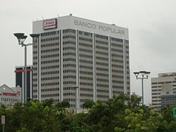Popular, Inc. headquarters in San Juan, seen from the Jose Miguel Agrelot Coliseum. BPPR Tower.JPG