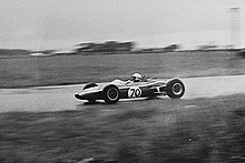 D. Powell's 1500cc Brabham BT14 in the Echo Trophy at the Llandow Circuit, South Wales, August 1966. Scanned print taken with a Halina 35X Super. Brabham BT14 (24021049591).jpg