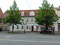 House with side wing in the courtyard