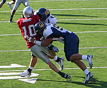 Cal defenders sack Washington State quarterback Alex Brink. CalatWSU.jpg