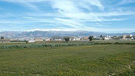 Vista de Churriana de la Vega, con Sierra Nevada al fondo