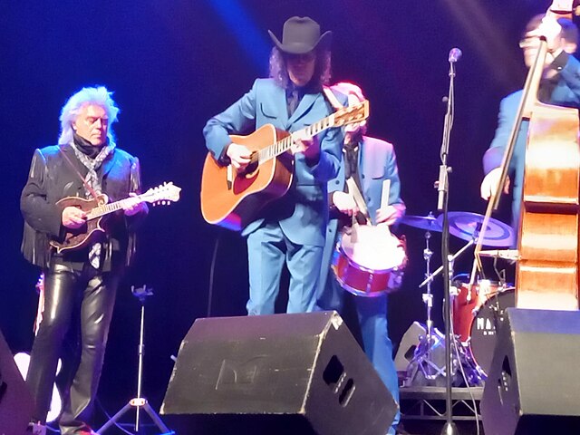 Vaughan (second from left) playing with Marty Stuart (left) in 2022