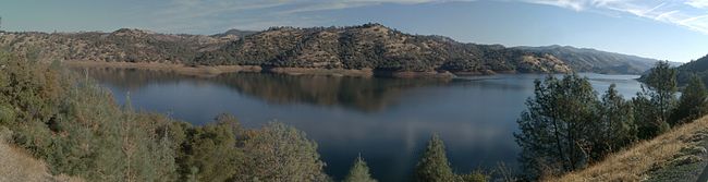Panorama of Don Pedro Reservoir and Sierra Nevada foothills.