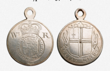 The first medal issued under the 1697 Act. This medal belonged to Elias Lindo, one of the brokers originally sworn in 1697, and is currently in the collection of the Museum of London. Elias Lindo Medal.png
