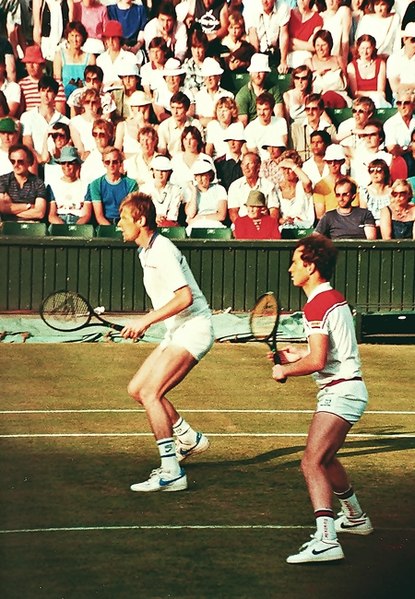 McEnroe with Peter Fleming (left) at Wimbledon, mid 1980s