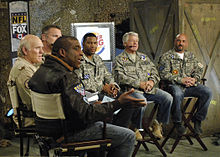 Strahan (center) with his Fox NFL Sunday co-hosts and the United States Air Force at the Bagram Airfield in 2009 Fox NFL Sunday team at Bagram Airfield 2009-11-07 2.JPG