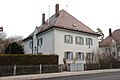 Wohnhaus Vockestraße 54 auf dem Gelände des Isar-Amper-Klinikum München-Ost (zuvor Bezirkskrankenhaus Haar, davor Kreis-Heil- und Pflegeanstalt Haar) in Haar, Landkreis München, Regierungsbezirk Oberbayern, Bayern. Als Baudenkmal unter Aktennummer D-1-84-123-9 in der Bayerischen Denkmalliste aufgeführt.