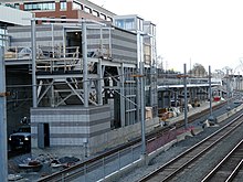 The headhouse under construction in 2022 Headhouse construction at Medford Tufts station (2), March 2022.JPG