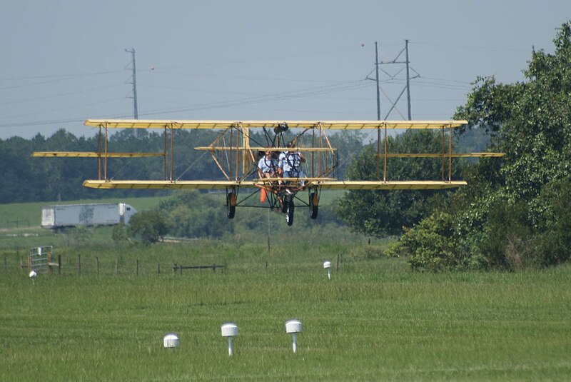 File:Herring-Curtiss Pusher 1909 Model D replica NX909JJ Employee Flights 2nd Landing 02 FOF 29June2012 (14588652994).jpg