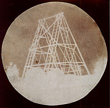 Herschel's first glass-plate photograph, dated 9 September 1839, showing the mount of his father's 40-foot telescope[26]