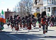The Caledonian Pipe Band performing in the parade, preceding the Grand Marshall's party