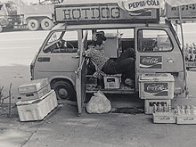 A hot dog truck in Shinjuku, Tokyo, Japan in the late 1970s or early 1980s Hot dog van without customers in street of Shinjuku, circa late-1970s or early-1980s (by Jun Shiraishi @Photozou 218980731).jpg