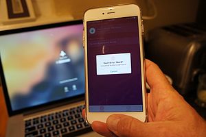 IPhone unlocking MacBook Pro with MacID (17199034187).jpg