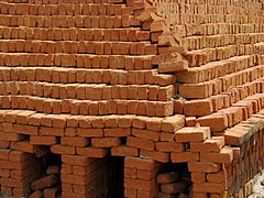 Dried bricks stacked ready for firing without the use of a kiln.