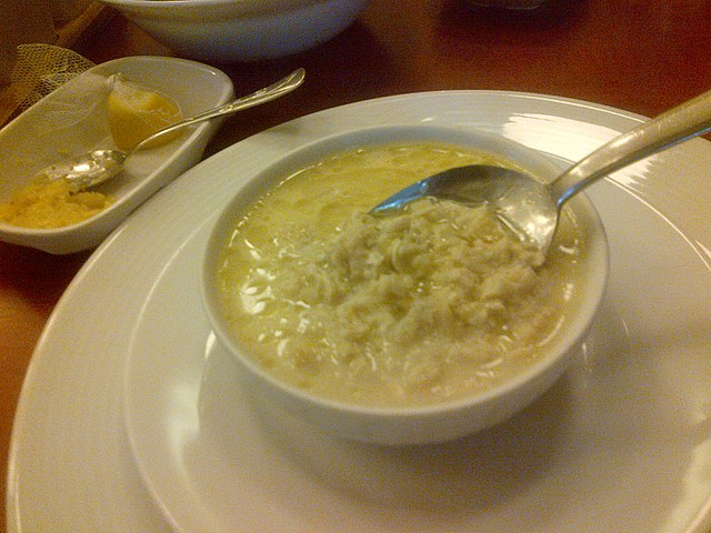 Ishkembe soup with a side dish of garlic sauce and lemon