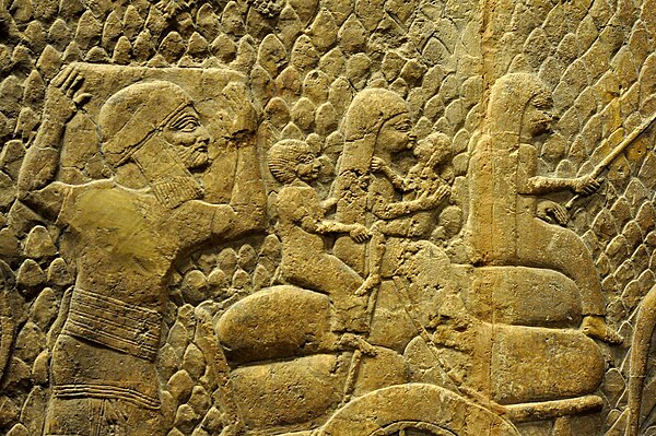Judaean prisoners being deported into exile to other parts of the Assyrian Empire. Wall relief from the Southwest Palace at Nineveh, Mesopotamia, date