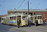 De beide voor de laatste ritten van de toeristentramlijn ingezette trams staat gereed voor de remise Nørrebro: gelede wagen 805 en vierasser 562; 24 september 1967.
