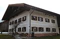 Kruggasse 5; Bauernhaus, Einfirsthof, zweigeschossiger Flachsatteldachbau mit Hochlaube, bez. 1778. This is a picture of the Bavarian Baudenkmal (cultural heritage monument) with the ID D-1-87-132-6 (Wikidata)